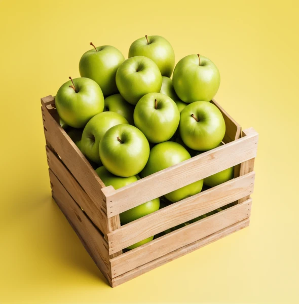 Green apples in a wooden crate